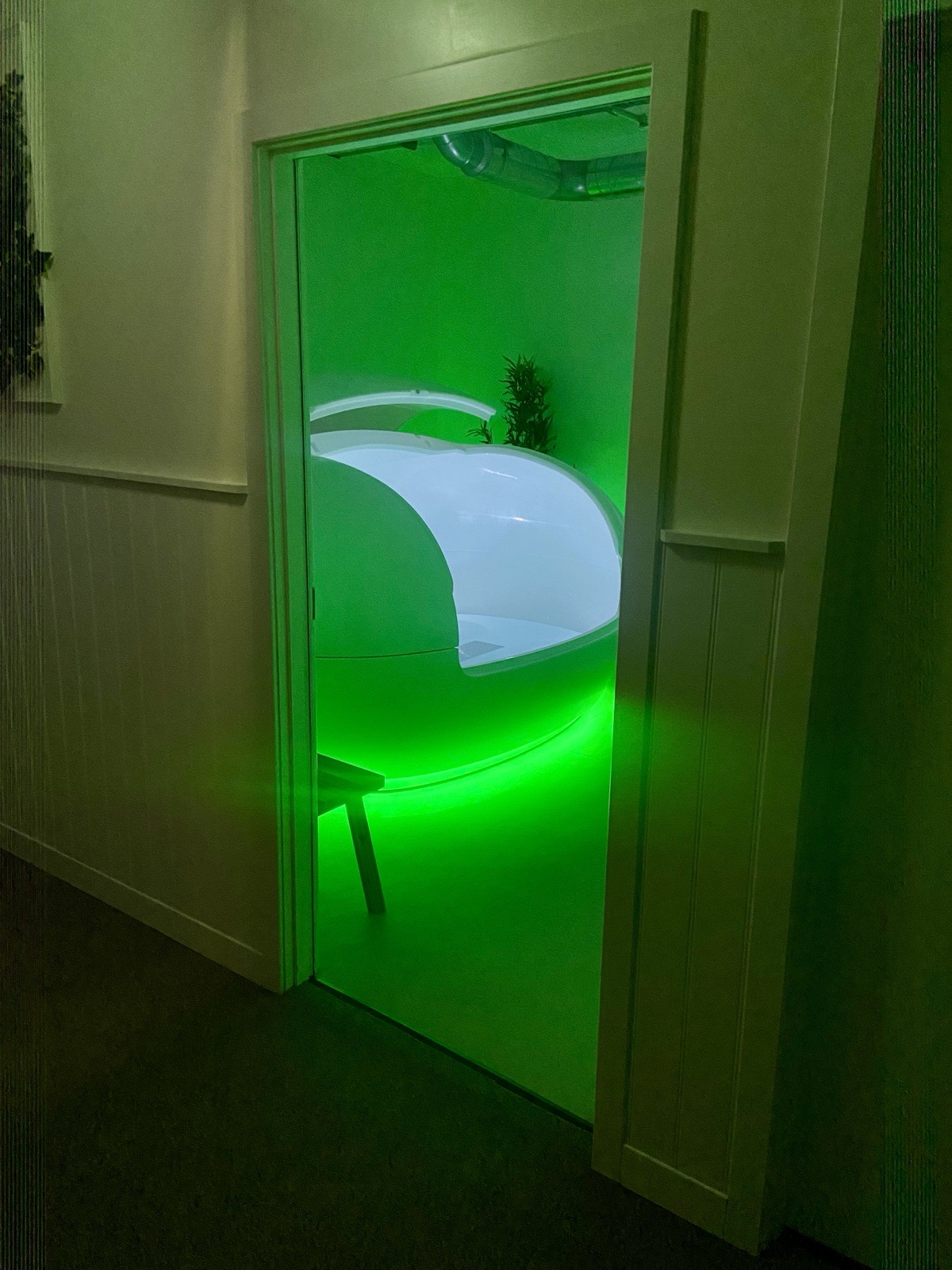 Private float room with an illuminated Orbit pod at FLOAT ONE Glasgow