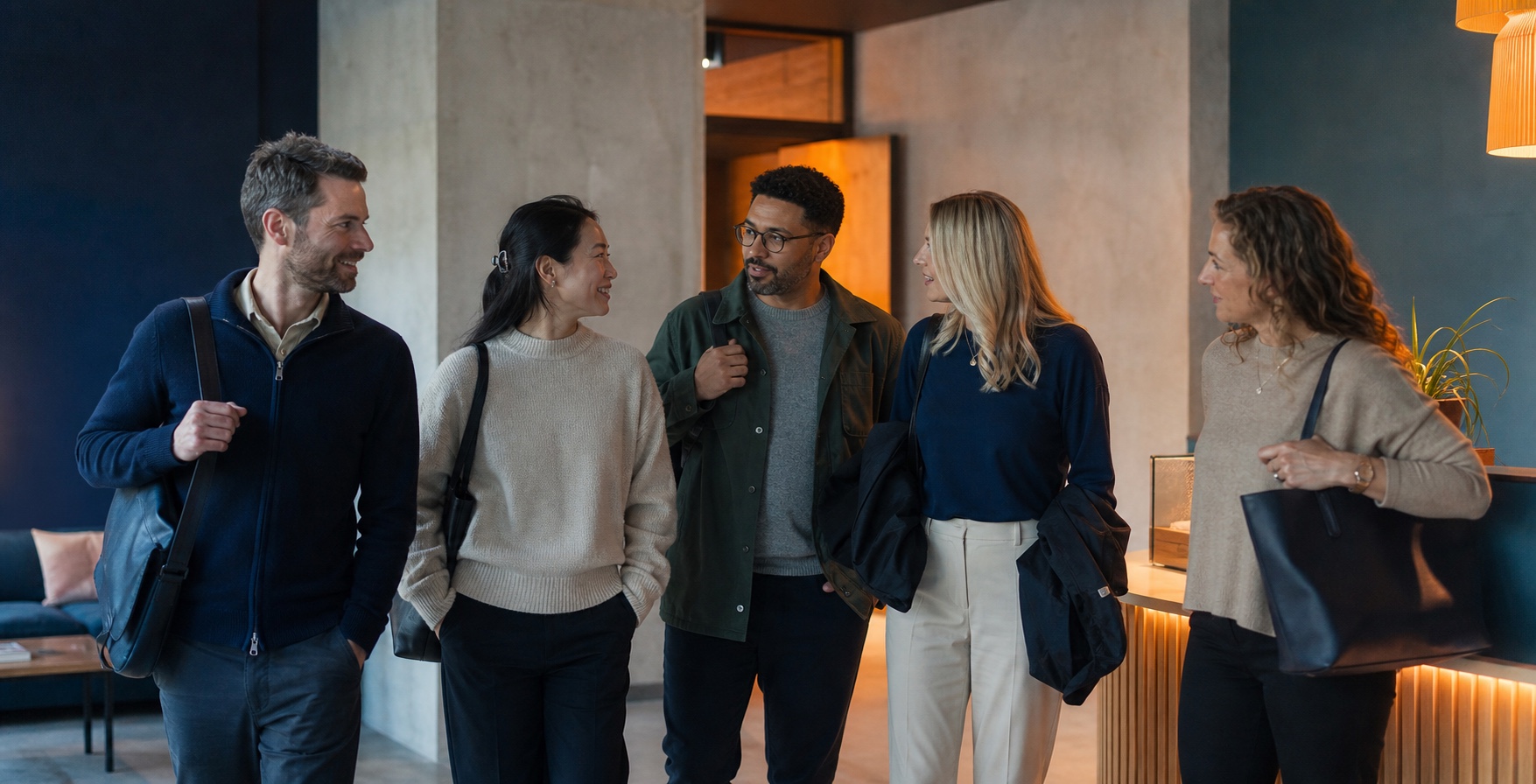 A diverse group of colleagues arriving together