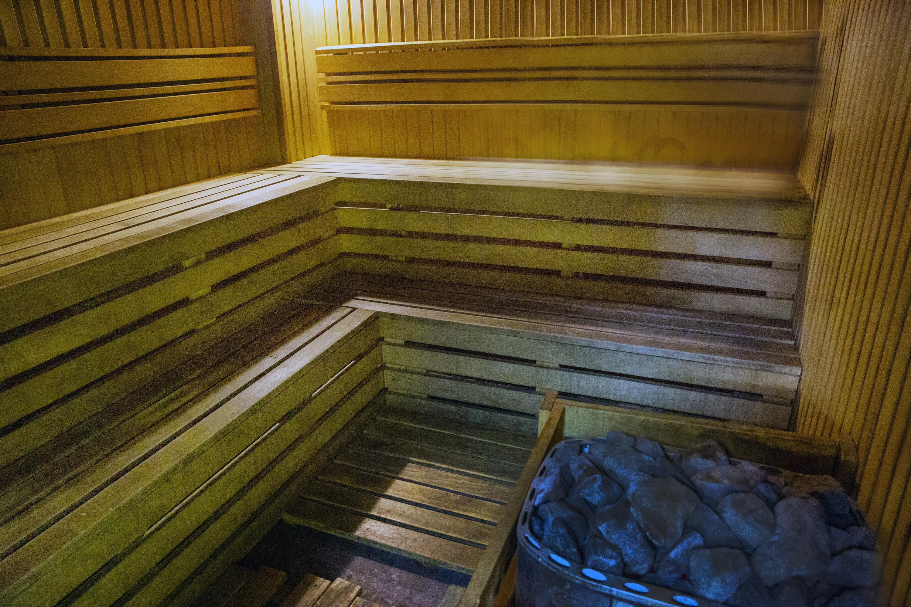 Warm timber interior of an infrared sauna