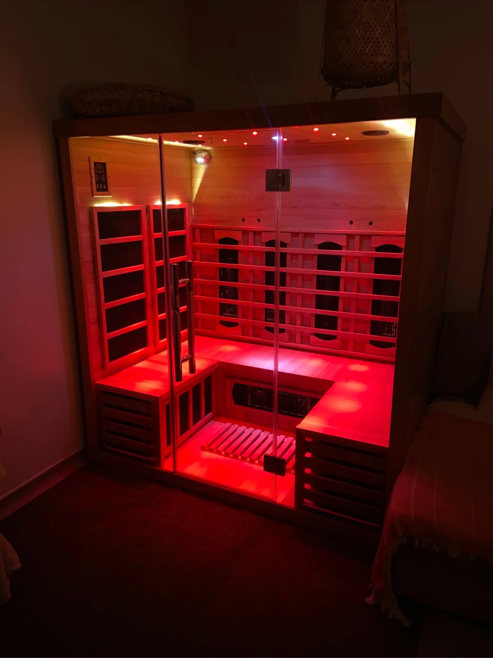 The private infrared sauna glowing warmly at FLOAT ONE Glasgow